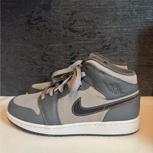Nike Gray and Black Jordan 1 Mid Sneakers